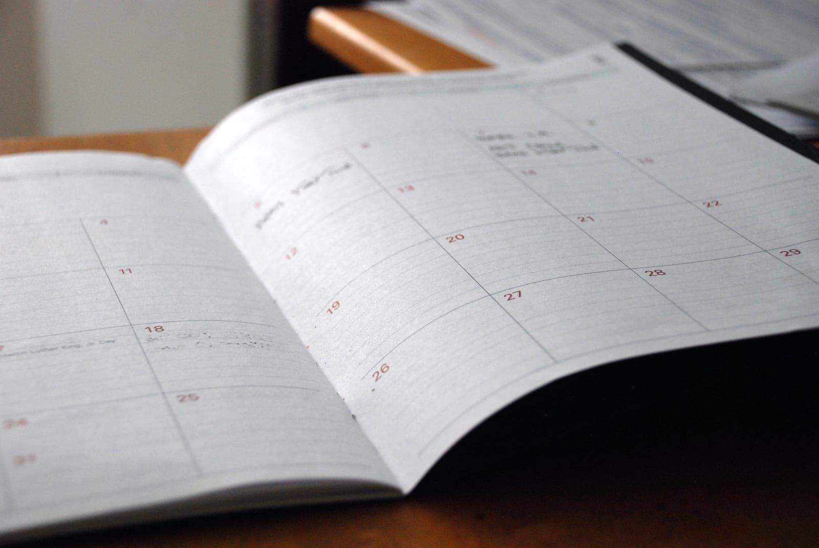 A calendar with entries indicating tasks to be done on different dates.
