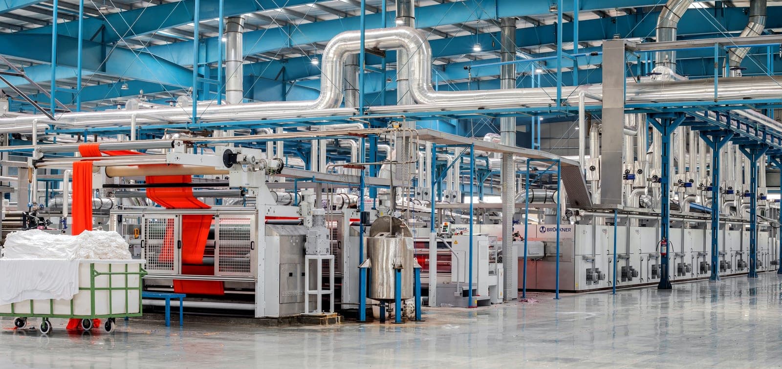 A factory with exposed services pipes.